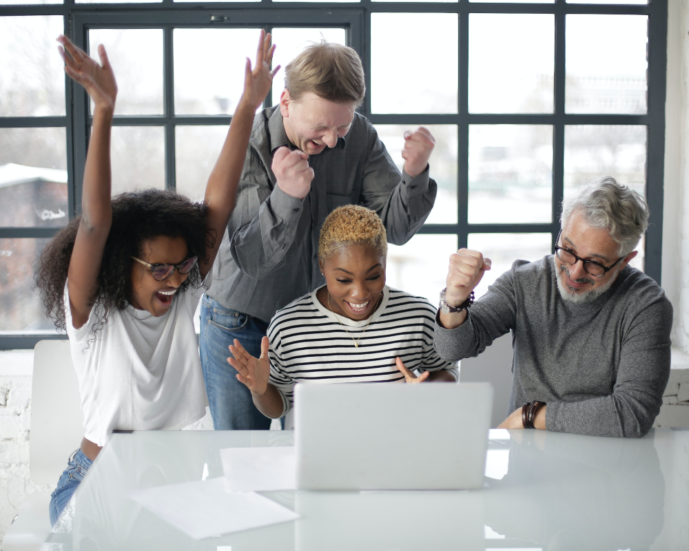 Group of some people watching in laptop